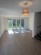 Wohnzimmer - Doppelhaushälfte mit eigenem Bachlauf & Garten – ca.135 m² auf 3 Etagen in Müllheim